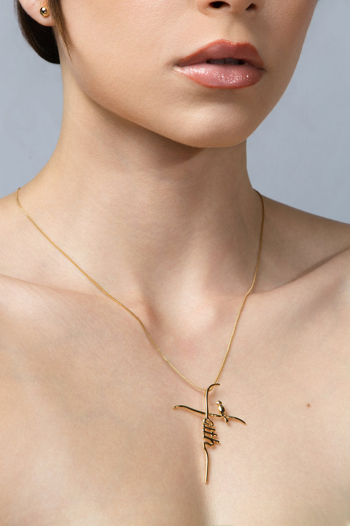 Faith Necklace  (crucifix with a little bird) - Guided by Faith Collection